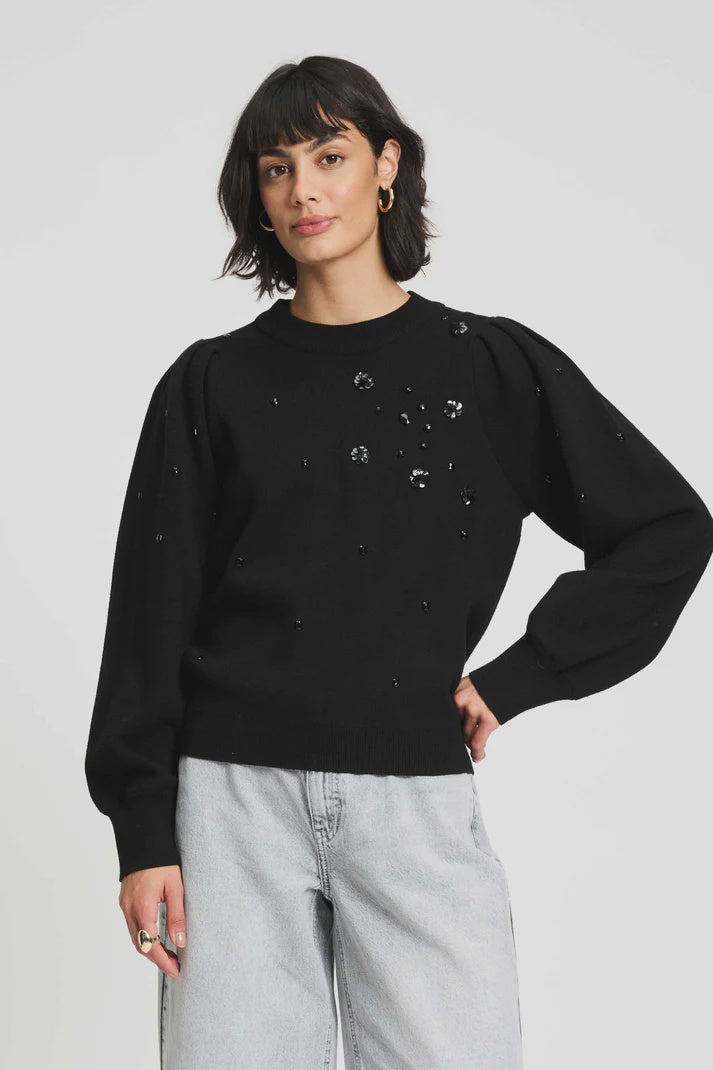 Black sweater with floral sequin embellishment