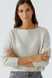 Seamless knitted pullover elaborately printed with silver gloss