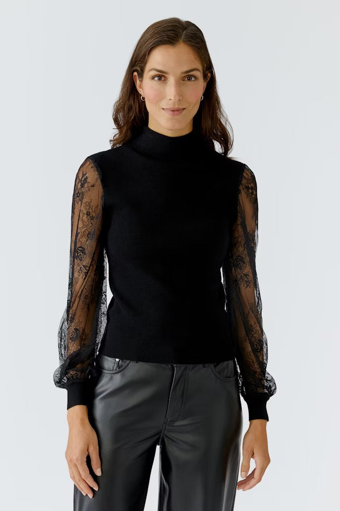Black pullover with floral lace sleeves