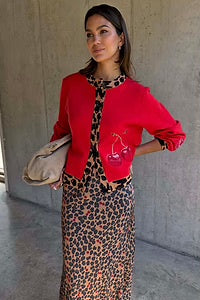 Soft touch cardigan in bright red with Cherry motifs.