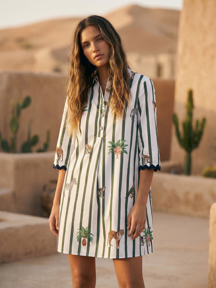 White tunic dress with green vertical stripes and animal print