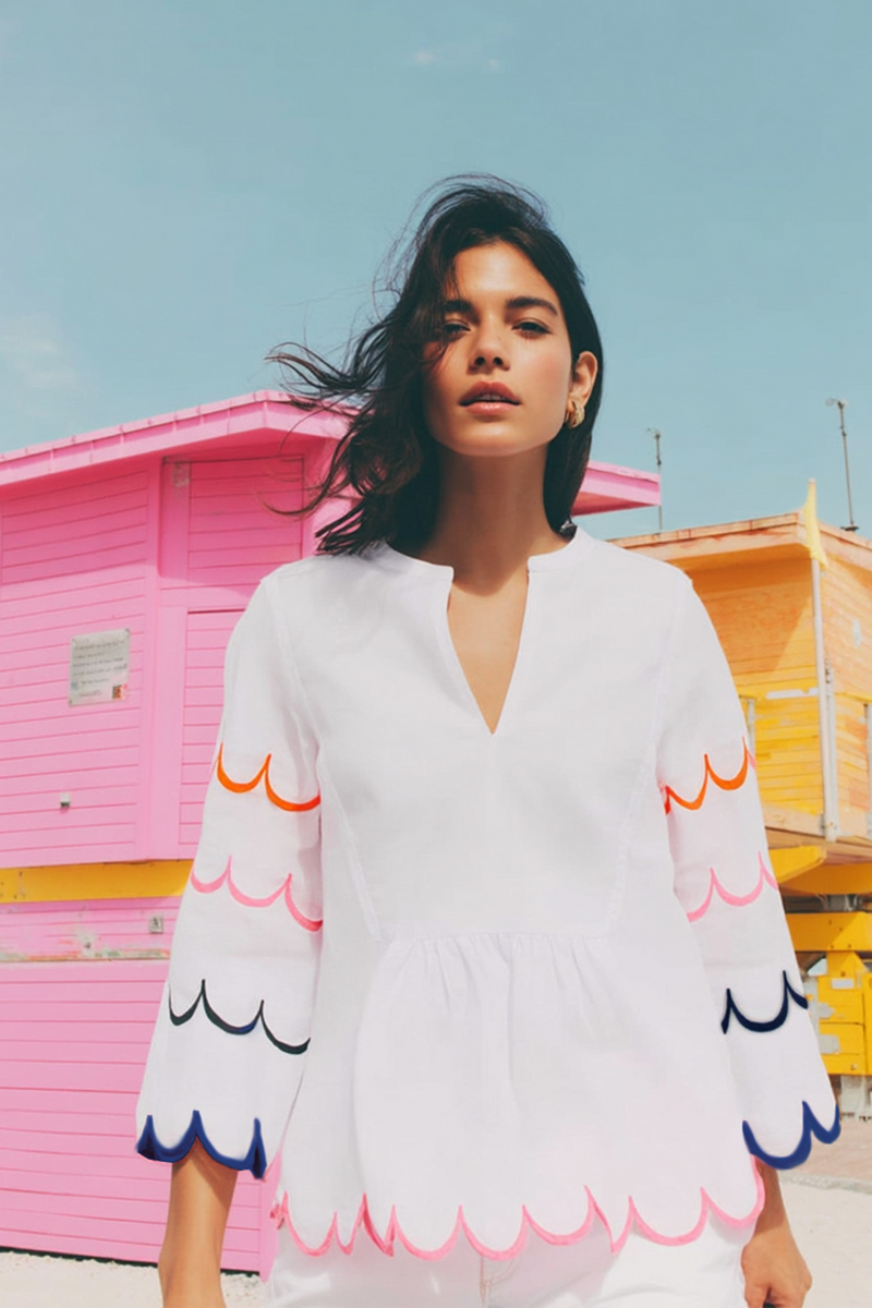 White linen top with notch neckline and scallop detail