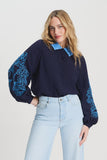 Elaborate blouse in dark blue with decorative collar