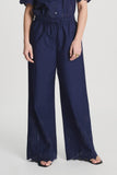 Dark blue trousers in Broderie Anglaise