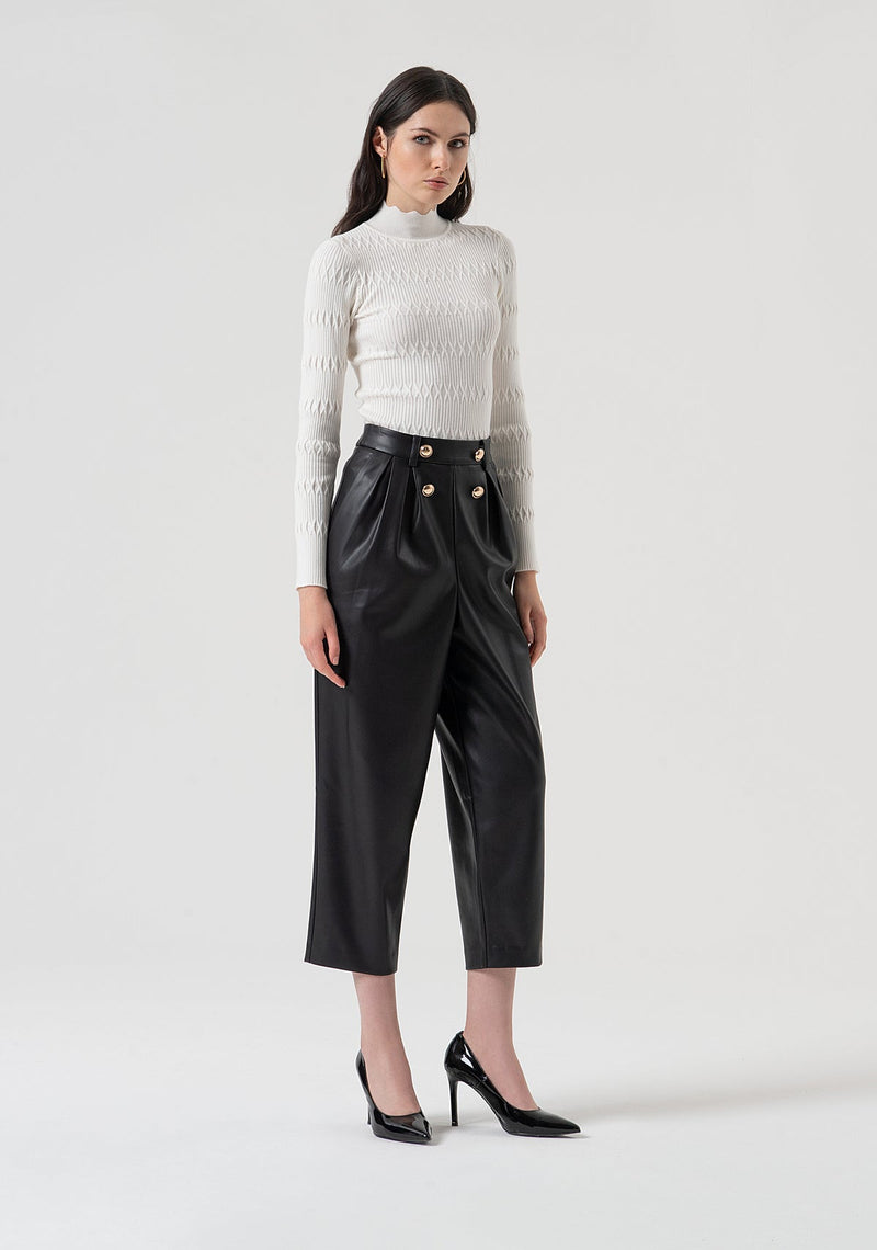 Black carrot trousers in leather look fabric