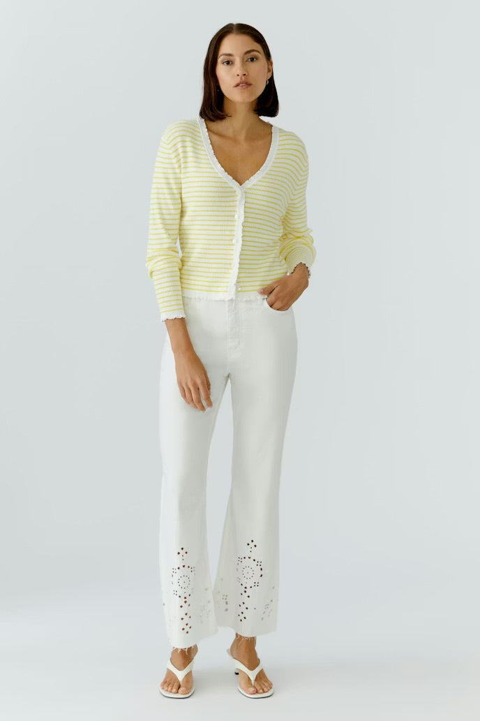 Cropped summer jeans with elaborate embroidery at the hemline