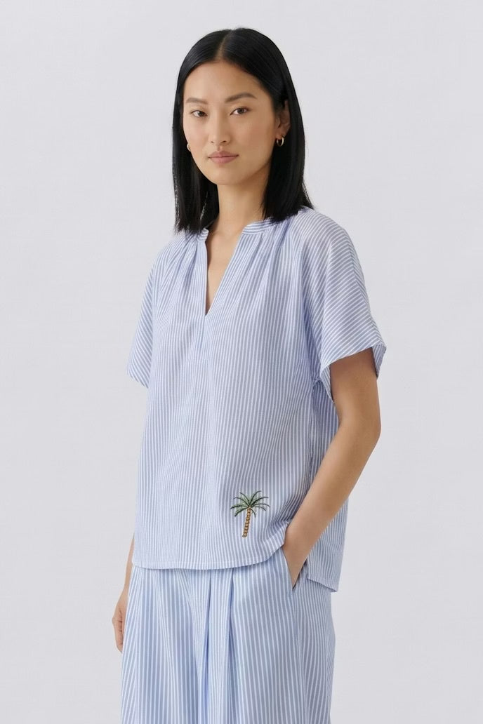 Blue and white tunic top