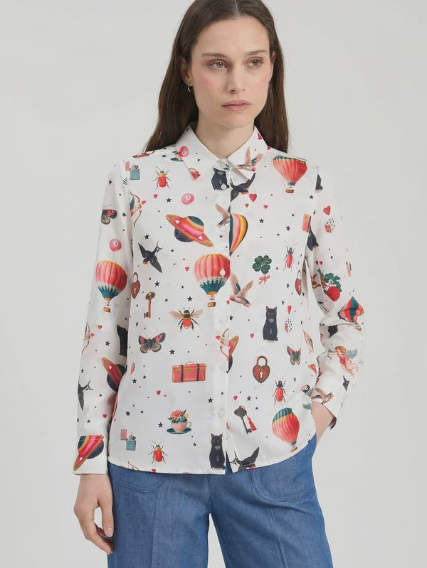off white shirt with an adventure inspired pattern