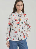 off white shirt with an adventure inspired pattern