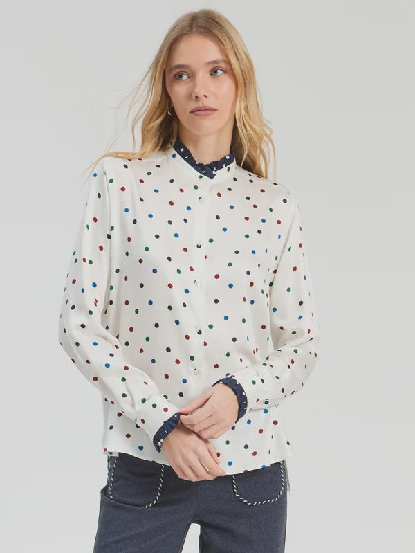 White polka dot shirt with back hotel detail