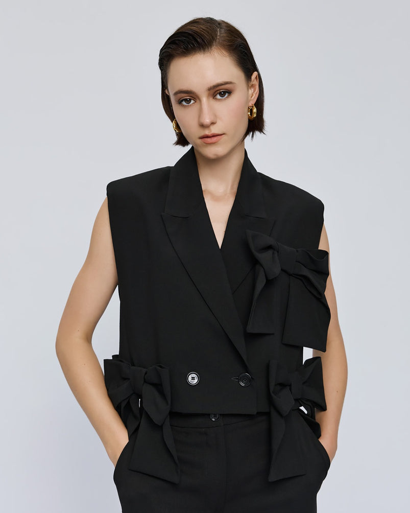 Black waistcoat with bows detail
