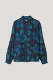 Dark blue blouse with a green floral print