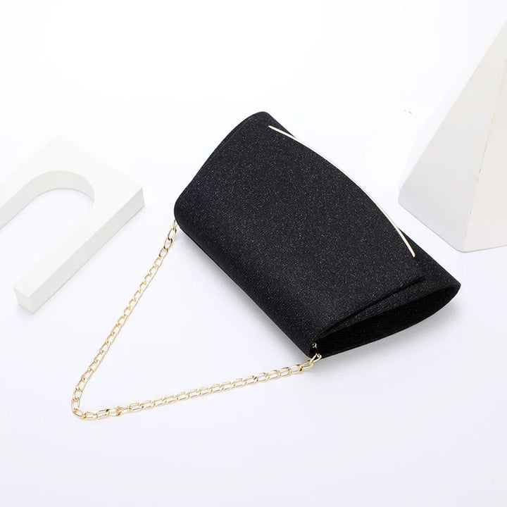 Black Sparkle a clutch with Gold Details