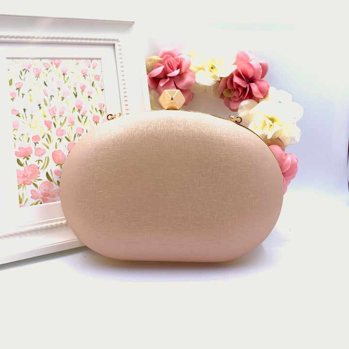 Rose gold oval clutch