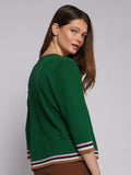 Dark green v neck sweater with multi coloured stripes