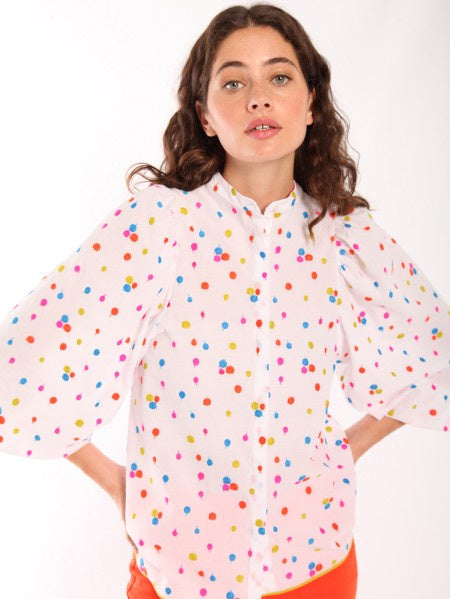 White polka dot shirt