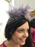 grey headpiece feathers
