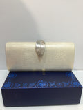 Gold shimmer clutch with feather clasp