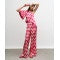 Satin printed pants in pink and cream