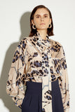 Beige printed blouse with bow neckline