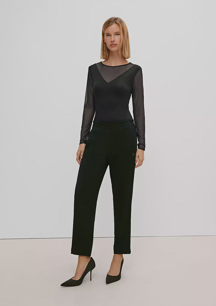 Black top with mesh sections
