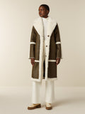 Olive green and cream coat with check back