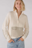 Cream ribbed sweater with zip collar and pocket