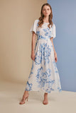 Blue and white dress with sequinned sleeves