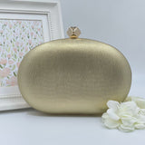 Gold oval clutch