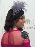 grey headpiece feathers