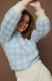 Knitted jacquard sweater in pastel blue and ecru