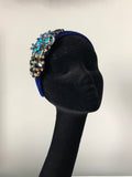 Plumeria Headpiece in Turquoise Gold Navy Crystals on a Royal Velvet Headband