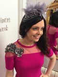 grey headpiece feathers