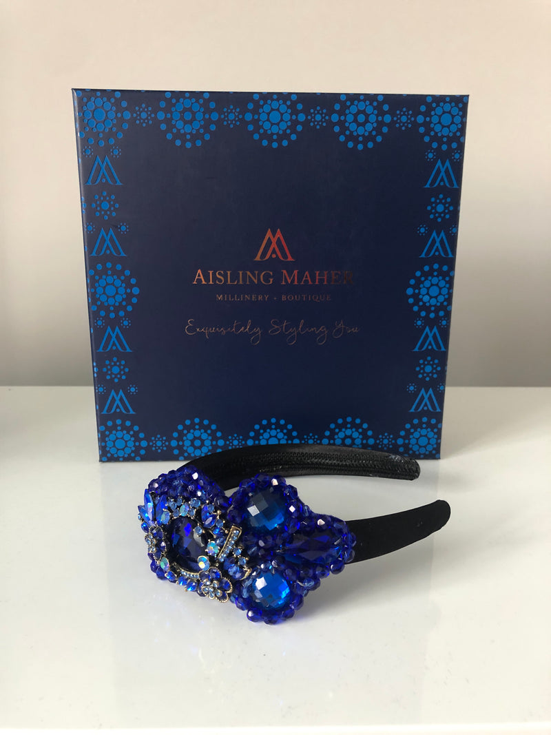 Plumeria Headpiece in Royal Blue on a Black Satin Band