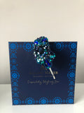 Plumeria Headpiece in Turquoise Gold Navy Crystals on a Royal Velvet Headband