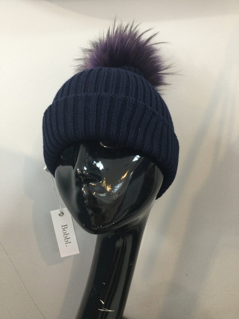 Navy hat with purple bobbl