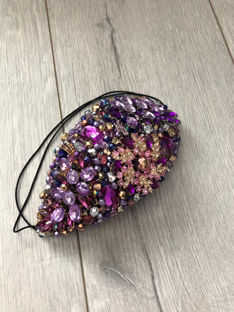 Teardrop in Purple Gold Silver with a hint of gold and rose gold.
