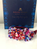 Large Plumeria Headpiece in Red, Pink, Turquoise, Blue and Gold on Red Velvet Band