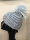 Baby blue hat with blue Bobbl
