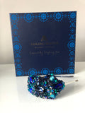 Plumeria Headpiece in Turquoise Gold Navy Crystals on a Royal Velvet Headband